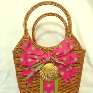 Bosom Buddies straw bag w/ pink and green ribbon